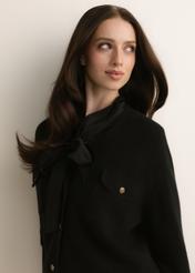 Black women's wool cardigan KARDT-0070-99(Z26), close-up of the product, on the model's silhouette.