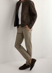 Men's dark brown leather moccasins BUTYM-0482-1H(W26), side view of the product on the model's feet, on a light background.