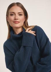 Navy blue women's turtleneck SWEDT-0249-68(Z25), product visible from the front on the model, close-up of the model's face.