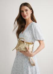 Small leather woven handbag TORES-1292-2X(W26) - product view, held by a model, against a light background. Half of the silhouette visible.