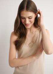 Beige wool and silk blouse BLUDT-0209-1B(W26) - front view of the product, on a model, against a light background. Half of the silhouette visible.