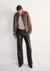 Women's brown leather trousers SPODS-0045-3207(Z25), product visible from the front on the model, the entire silhouette is visible.