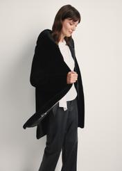 Women's black fur coat with hood FUTDP-0073-99(Z25) - side view of the product on a model against a white background. Knee-length silhouette visible.