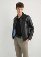 Black men's leather jacket KURMS-0407-99(W26), front product view on model. Half silhouette visible.