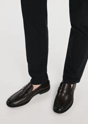 Men's brown leather moccasins BUTYM-0482-1I(W26), top view of the product on the model's feet, isolated on white background.