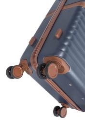 Medium suitcase on wheels WALAB-0084-7D-24(W26), view of the product wheels on a white background.