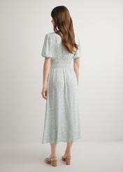 Sage floral long dress SUKDT-0191-8P(W26), back view of the product on the model. Full body visible.