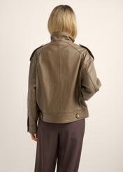 Brown oversized women's leather jacket KURDS-0648-9B(Z26), back view of the product on the model. Half of the silhouette visible.