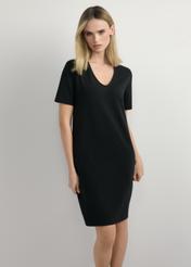 Black cotton dress SUKDT-0185A-99(W26), front view of the product on the model. Half of the silhouette visible.