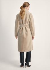 Women's faux fur coat with belt FUTDP-0002A-81(Z24), product visible from the back on the model, the entire silhouette is visible.