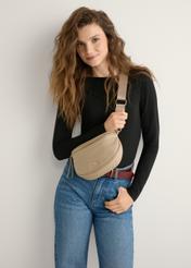 Beige women's waist bag TOREC-1191-1B(W26), front view of the product on the model. Half of the silhouette visible.