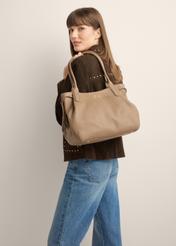 TORES-1360-1K(Z26) dark beige leather shopper bag - front view of the product, on a model, against a light background. Knee-length silhouette visible.