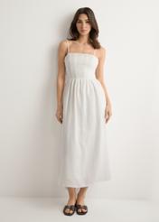 White linen midi dress with straps SUKDT-0279-0B(W26), front view of the product on the model. Full body visible.