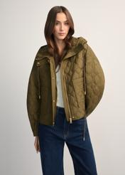 Olive green short quilted oversize jacket KURDT-0660-8D(W26) - front view of the product, on a model, against a light background. Half of the silhouette visible.