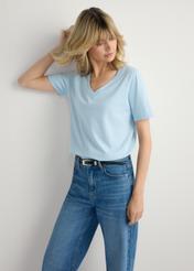 Light blue women's basic T-shirt TSHDT-0120-7A(W26), front view of the product on the model. Half of the silhouette visible.