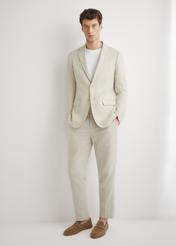 Men's beige herringbone suit trousers SPOMT-0117-1B(W26), front product view on model. Full body visible.