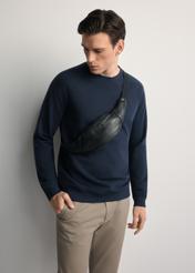 Men's black leather waist bag TORMS-0417A-99(Z25) - front view of the product, on a model, against a white background. Half of the silhouette visible.