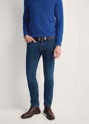 Navy blue men's jeans JEAMT-0022-17(Z25) - front view of the product on a model on a white background. Half of the silhouette visible.