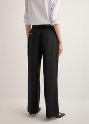 Women's black wide-leg trousers with a crease SPODT-0126-99(Z26), back view of the product on the model. Half of the silhouette visible.