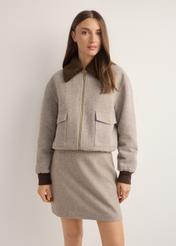 Women's short beige wool jacket PLADT-0077-1B(Z26), front view of the product on the model. Half of the silhouette visible.