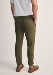 Men's khaki sweatpants SPOMT-0101-55(Z25), back view of the product on the model. Half of the silhouette visible.