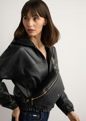 Black women's waist bag TOREC-0788C-99(Z25), product view on the model's silhouette.