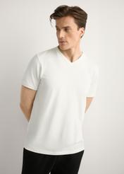 Men's white cotton T-shirt TSHMT-0088-0B(W26), front view of the product on the model, half of the silhouette visible.