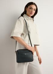 Small black leather women's handbag TORES-1269-9I(W26), product view on model's shoulder. Half of silhouette visible.