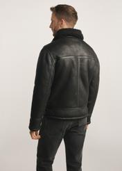 Classic black men's sheepskin coat KOZMP-0001A-99(Z24), product visible from the back on the model, half of the silhouette visible.