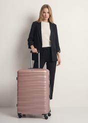 Large suitcase on wheels WALAB-0081-5X-28(W26), front view of the product next to the model's silhouette.