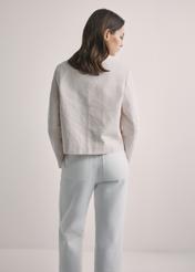 Light beige women's linen jacket KURDT-0652-1A(W26), back view of the product on the model. Half of the silhouette visible.