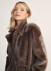 Women's long brown sheepskin coat KOZDS-0086- 3094(Z25) - front view of the product on a model, against a white background. Half of the silhouette visible.