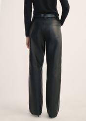 Women's black wide-leg leather trousers SPODS-0038-5339(Z25), rear view of the product on the model. Half of the silhouette visible.