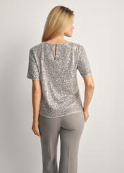 Silver sequin women's blouse BLUDT-0199-92(Z25), product view from the back on the model, half of the silhouette visible.