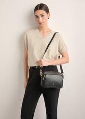 Women's black leather shoulder bag TORES-1331-99(Z26), product view on model's shoulder. Half silhouette visible.