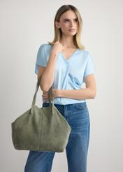 Sage leather women's handbag TORES-1252-8F(W26) - front view of the product, on a model, against a light background. Knee-length silhouette visible.