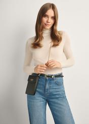 Black women's bag  TOREC-1112-9I(Z26), front view of the product on the model, half of the silhouette visible.