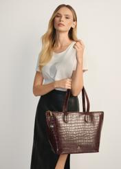 Women's brown leather shopper handbag TORES-0939E-89(Z25), front view of the product on a model, half of the silhouette visible.