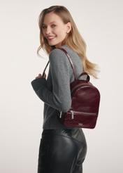 Burgundy leather women's backpack TORES-1173-49(Z25) - product view on a model on a white background. Half of the silhouette visible.