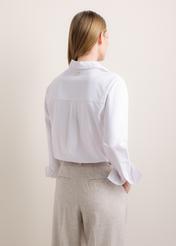 Women's long-sleeved white shirt KOSDT-0196-0A(Z26), rear view on a model. Half-body shot.