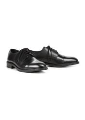 Black leather men's shoes BUTYM-0512-99(Z25), diagonal product view on a white background.