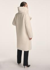 Women's long cream fur coat with scarf FUTDP-0069-12(Z25), back view of the product on the model. Full body visible.