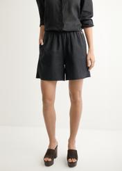 Women's black linen shorts SZODT-0019-99(W26), front view of the product on the model. Half of the silhouette visible.