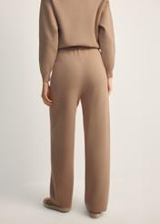 Women's camel viscose trousers SPODT-0116-24(Z25), back view of the product on the model. Half of the silhouette visible.