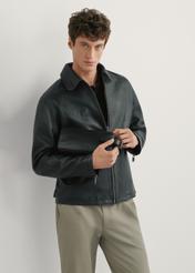 Black leather men's cosmetic bag TORMS-0412R-9I(W26), front view of the product on the model, half of the silhouette visible.