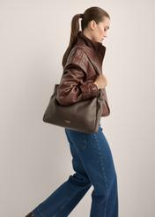 Women's brown leather shoulder bag TORES-1376-1H(Z26), front view of the product on a model. Half of the silhouette visible.