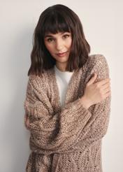 Women's long cardigan in camel color KARDT-0055-24(Z25), close-up of product detail on model. Half of silhouette visible.