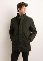 Green men's long winter jacket KURMT-0432-8B(Z26), front product view on model. Half silhouette visible.