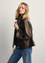 Women's dark brown leather jacket KURDS-0604-1I(W26), side view of the product on the model. Half of the silhouette visible.