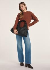 Black fabric women's handbag TOREN-0330-99(Z25) - front view of the product on a model against a white background. Full body visible.